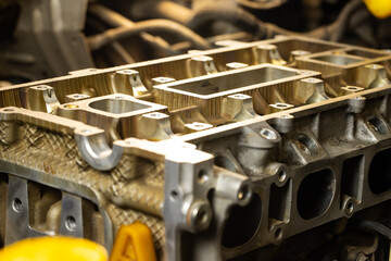 Disassembled car engine.  Car service.  Maintenance post.