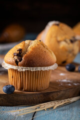 
Fresh cupcakes on a wooden table