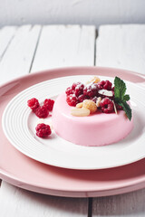 Raspberry panna cotta dessert.