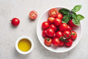 Naklejka na ściany i meble Cherry tomatoes and olive oil.