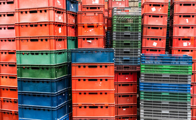 Piles of boxes for transporting products.  Pallets for storage.