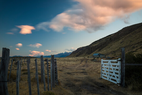 Ranch gate at dusk, El Chalten,  Los Glaciares National Park,  Santa Cruz Province, Argentina
