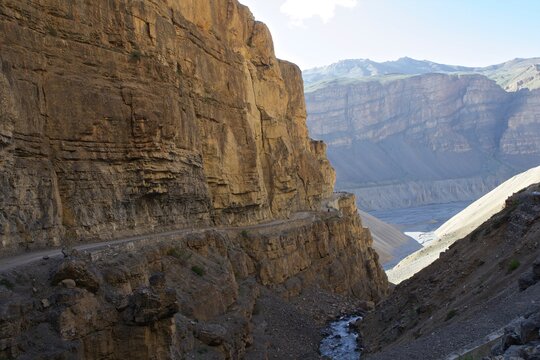 Road along rock face, Himalayas, Himachal Pradesh, India