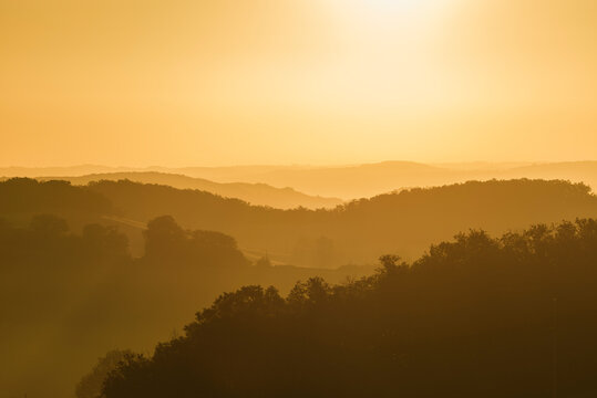 Misty landscape at sunrise, Prades, Midi Pyrenees, France