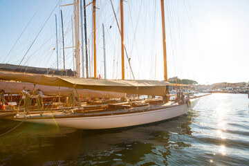 Yacht moored up on waterfront, St Tropez, South of France