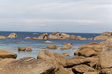 Fototapeta na wymiar Rocks at the beach Plage du Phare in Brittany, France.