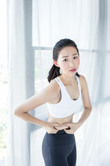 Fototapeta na wymiar woman stomach pain after jogging work out. Female athlete.