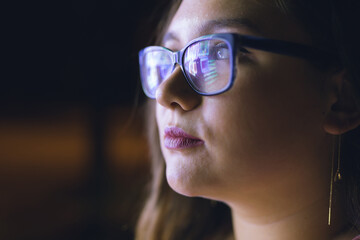 Cute woman in optical glasses for myopia treatment
