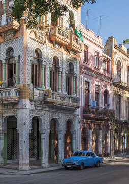 Blue vintage car and colonial architecture at Paseo del Prado, Havana, Cuba