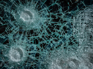 Glass broken into pieces of shop window, close-up