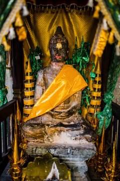 Buddhist statue in golden shrine, Angkor Wat, Cambodia