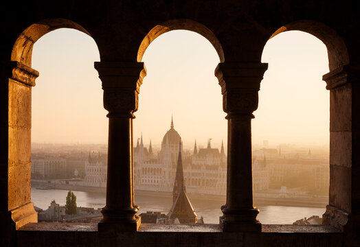 View from Fishermans Bastion over Danube River & Hungarian Parliament Building at dawn, Budapest, Hungary
