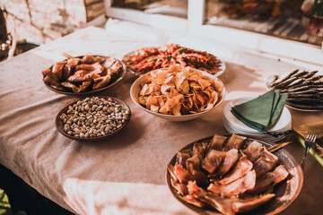Table with food for the holiday. Cuisine. Culinary Buffet. Dinner Catering. Dining Food. Celebration Party. Concept wedding birthday. Sweet pastries desserts