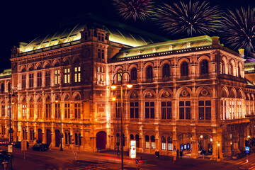 Fototapeta na wymiar Fireworks over the Opera in Vienna . Christmas night in Wien
