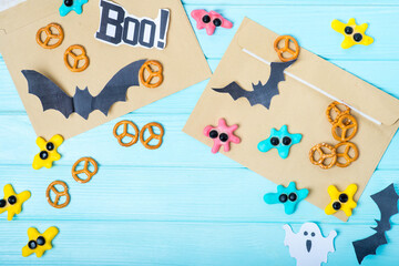 preparation for Halloween, cutting out decor for Halloween