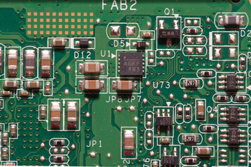 macro photo of a printed circuit board with chips