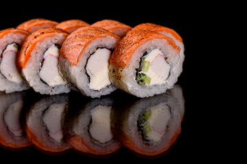 Fresh sushi rolls prepared from the best varieties of fish and seafood
