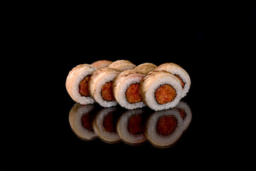 Fresh sushi rolls prepared from the best varieties of fish and seafood