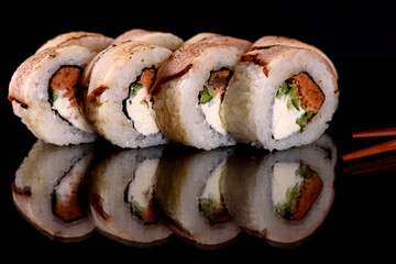 Fresh sushi rolls prepared from the best varieties of fish and seafood