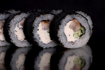 Fresh sushi rolls prepared from the best varieties of fish and seafood