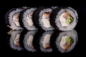 Fresh sushi rolls prepared from the best varieties of fish and seafood