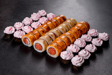 Fresh sushi rolls prepared from the best varieties of fish and seafood