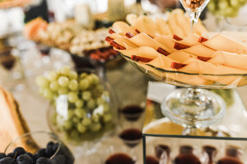 Table with food for the holiday. Cuisine. Culinary Buffet. Dinner Catering. Dining Food. Celebration Party. Concept wedding birthday. Sweet pastries desserts