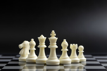 Fototapeta premium White chess pieces on the board for business or team strategy planning concept