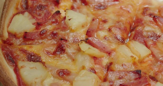 Delicious fresh pineapple pizza close up