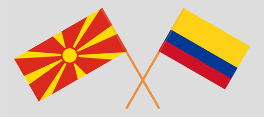 Crossed flags of North Macedonia and Colombia