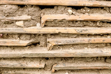 Background of old tiles with cement mortar, close-up, side view