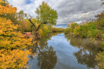 Oklahoma City's Lake Hefner surrounded by trees in fall color