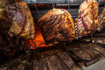 Brazilian style beef ribs Barbecue grill on skewers  at a churrascaria steakhouse in Brazil. © AlfRibeiro