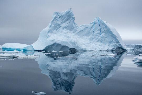Reflection of iceberg in water