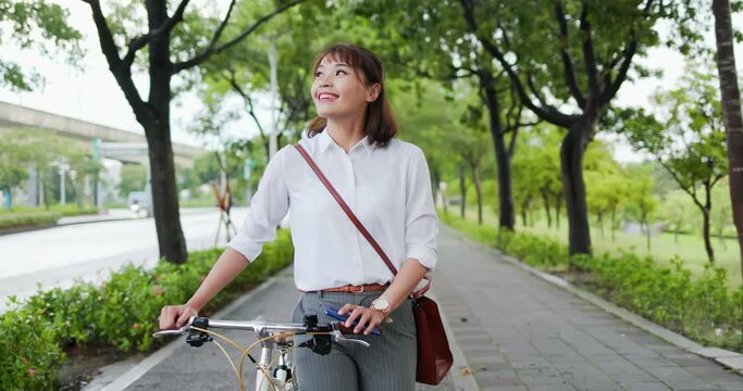 Asian woman in streets of commuting
