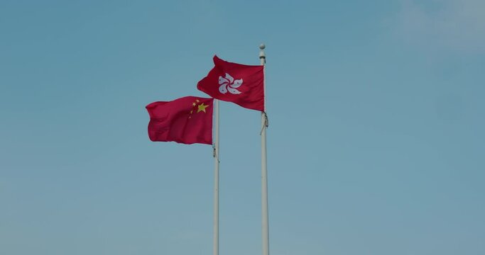 Flag of China and Hong Kong Waving with blue sky