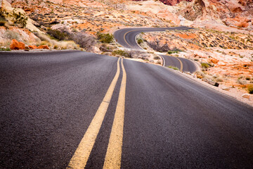 View of road passing through desert landscape