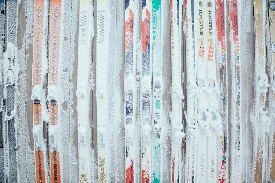 Snow covered skis mounted to wall of Corbet's Cabin