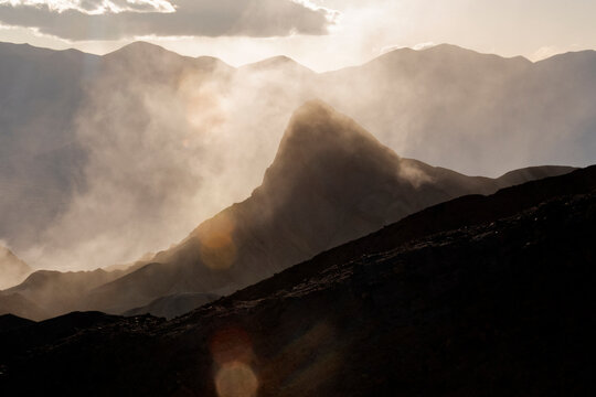 Scenic view of strong windstorm dust from Badwater Basin over Zabriskie Point in Death Valley