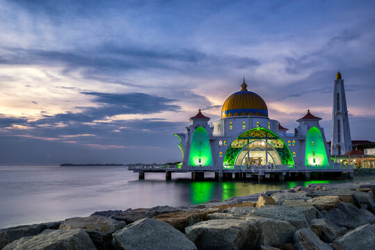 Exterior view of Melaka Straits Mosque against cloudy sky