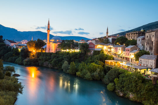 View of illuminated Mostar city at dusk