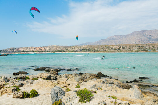 Scenic view of Kite boarders over Elafonissi Beach