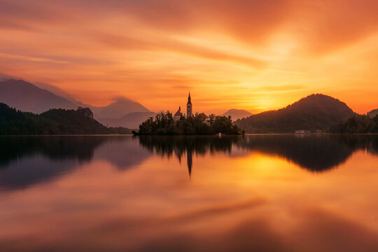 Pilgrimage Church of the Assumption of Maria in Lake Bled during sunrise