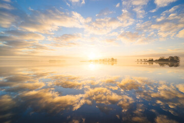 Reflection of cloudy sky in lake