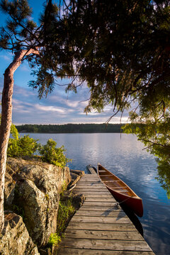 Canoe moored at dock of Mica Island