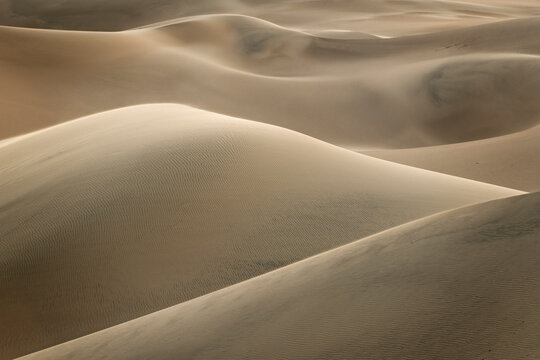 View of sand dunes during sunset