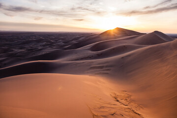 View of sand dunes in Gobi Desert during sunset