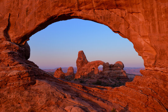 Scenic view of Turret Arch in Arches National Park during sunset