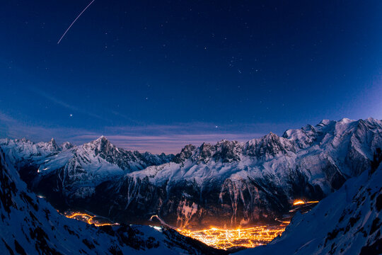 Scenic view of mountain range at night - Powered by Adobe