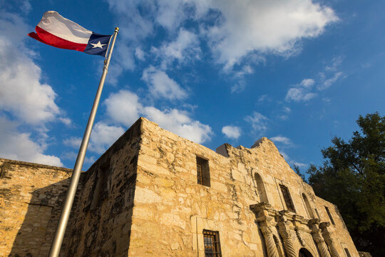 Low angle view of The Alamo against cloudy sky